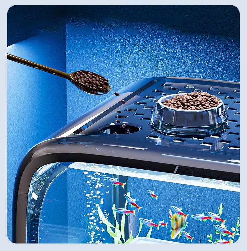 102d4b72-fcad-4a3c-9c16-bf52aecc2ae1-2jpg - Aquassi Ltd | Award-winning Aquarium Design & Aquascaping Close-up of a Sleek Blue Coffee Machine Top, with a Spoon Scooping Coffee Beans into a Glass Bowl, Above an Aquarium Visible Below.