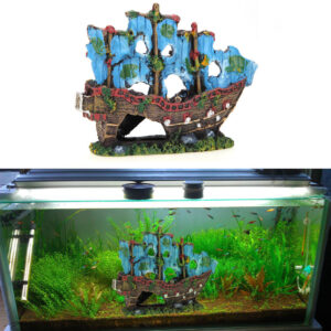 Colorful decorative shipwreck ornament in a planted home aquarium.