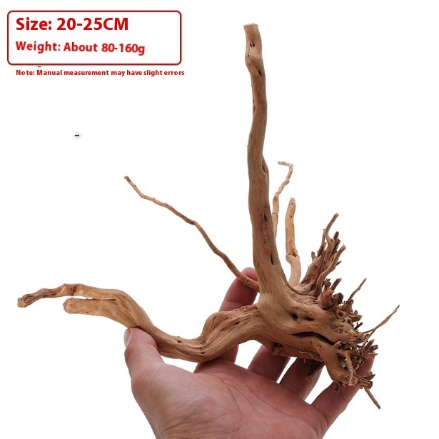 Ca56adb9-99ce-4bde-9727-b45f615bec19_trans-1jpeg - Aquassi Ltd | Award-winning Aquarium Design & Aquascaping Driftwood Root Fragment Held in a Hand Next to a Label Reading Size 20–25 Cm and Weight About 80–160 G.